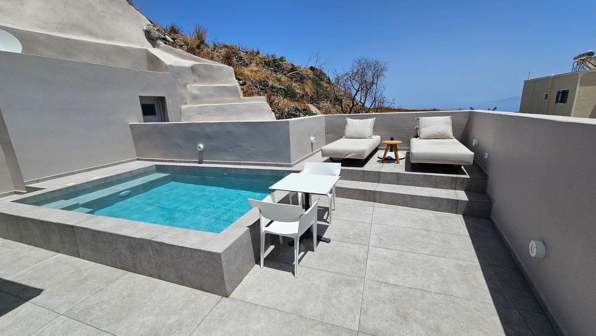 Petroma Cave Suites Vourvoúlos Oda fotoğraf